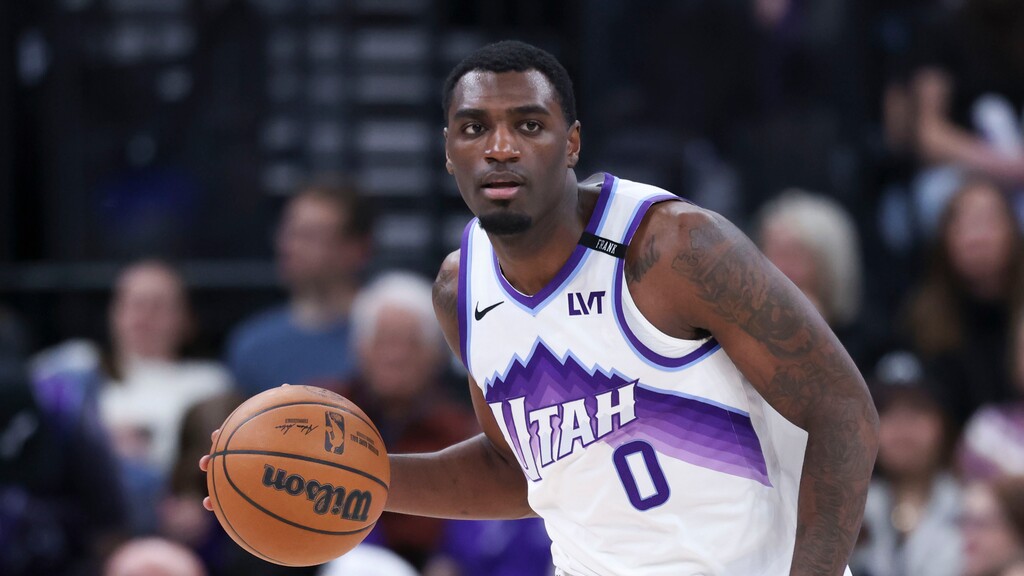 (Rob Gray | AP) Utah Jazz guard Vince Williams Jr. (0) brings the ball up the court against the Sacramento Kings during the second half of an NBA basketball game, Wednesday, Feb. 11, 2026, in Salt Lake City.