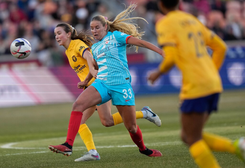 (Francisco Kjolseth  |  The Salt Lake Tribune) Utah Royals defender Kate Del Fava battles Chicago Red Stars forward Ally Cook (33) during their season opener at America First Field Saturday, March 16, 2024, in Sandy, Utah.