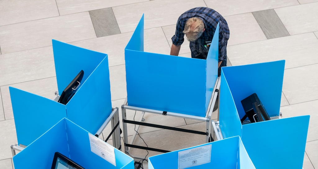 (Rick Egan | The Salt Lake Tribune) A voter at the West Valley City Hall in 2021.