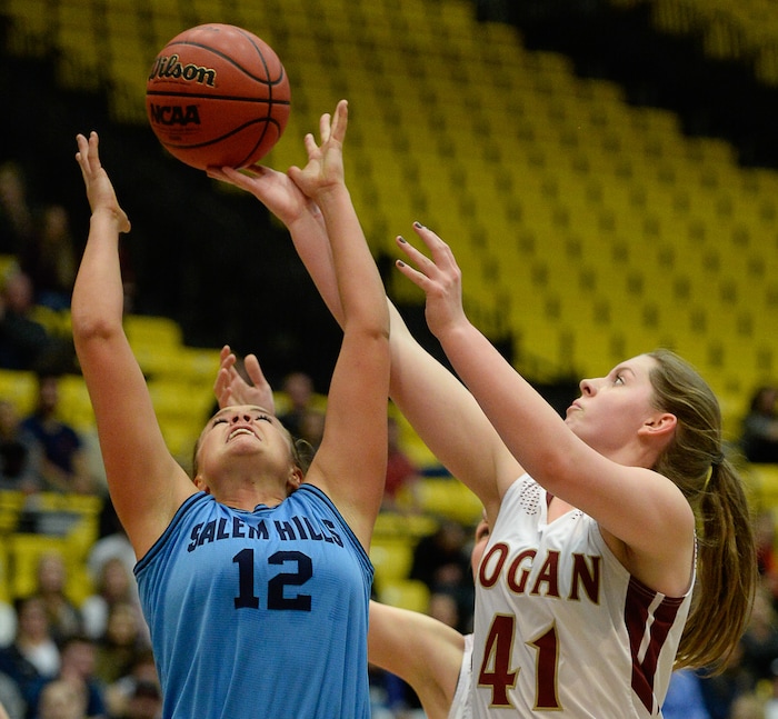 (Francisco Kjolseth  |  The Salt Lake Tribune)  Logan vs Salem Hills, 4A girls State high school semi finals basketball tournament at Utah Valley UniversityÕs UCCU Center, Friday March 2, 2018. Salem Hills' Lauren Gustin (12) battles for a rebound against Shaylee Anderson (41) of Logan. 