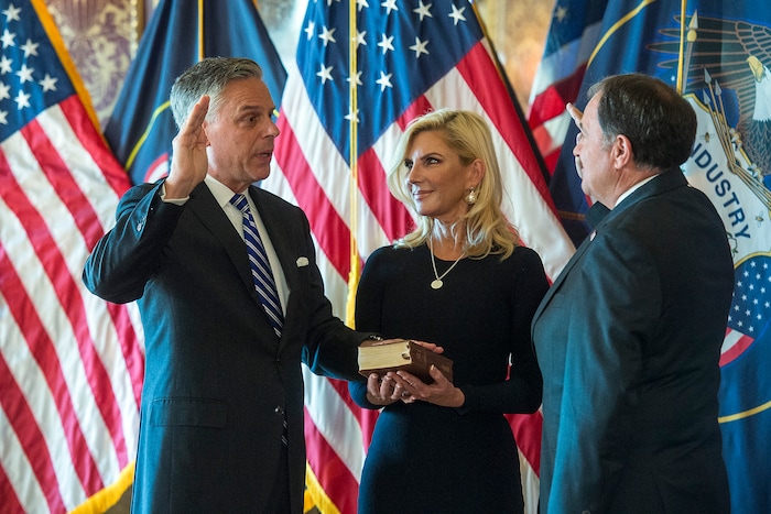 (Chris Detrick  |  The Salt Lake Tribune)  Gov. Gary R. Herbert swears in Jon M. Huntsman, Jr. as U.S. Ambassador to Russia during an Ambassadorial Swearing in Ceremony at the Utah Capitol Saturday, October 7, 2017. Mary Kaye Huntsman is in the middle.