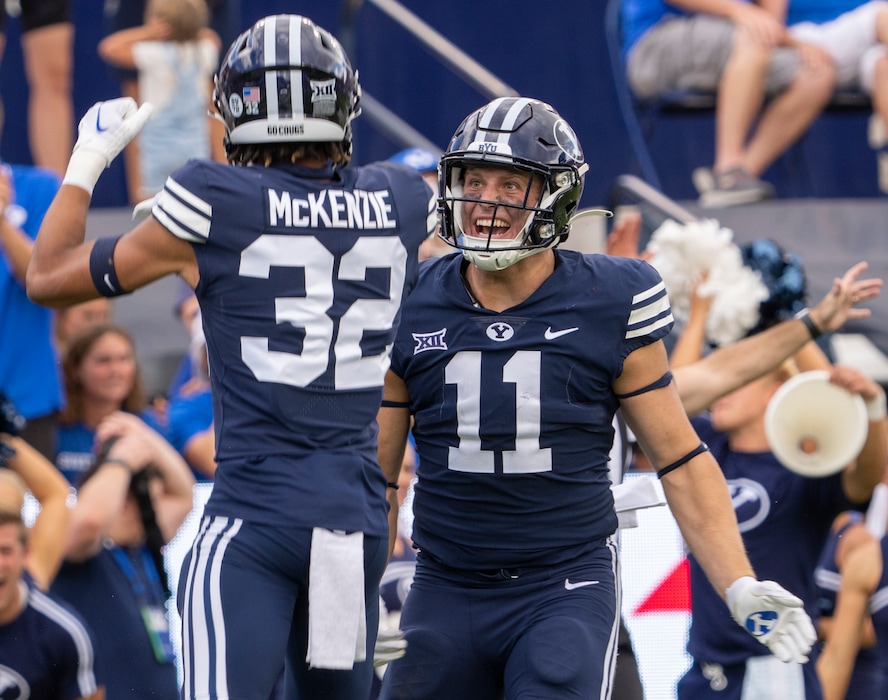 (Rick Egan | The Salt Lake Tribune) Brigham Young cornerback Marcus McKenzie (32) with linebacker Harrison Taggart (11), celebrates after picking up a Southern Utah Thunderbirds fumble, in football a between the Southern Utah Thunderbirds and the Brigham Young Cougars, at Lavell Edwards Stadium, on Saturday, Sept. 9, 2023.