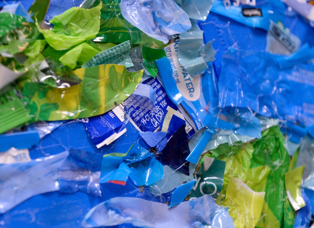 (Leah Hogsten  |  The Salt Lake Tribune) Students at Parkview Elementary have created a treasure with trash. Ten fifth graders in Cher Sten’s extended learning program or ELP class, molded school and household plastic refuse into a mosaic to send the message— “Consume Less” to their classmates. The idea for the mural began after a discussion about global warming, climate issues, plastic pollution and its implications on earth.