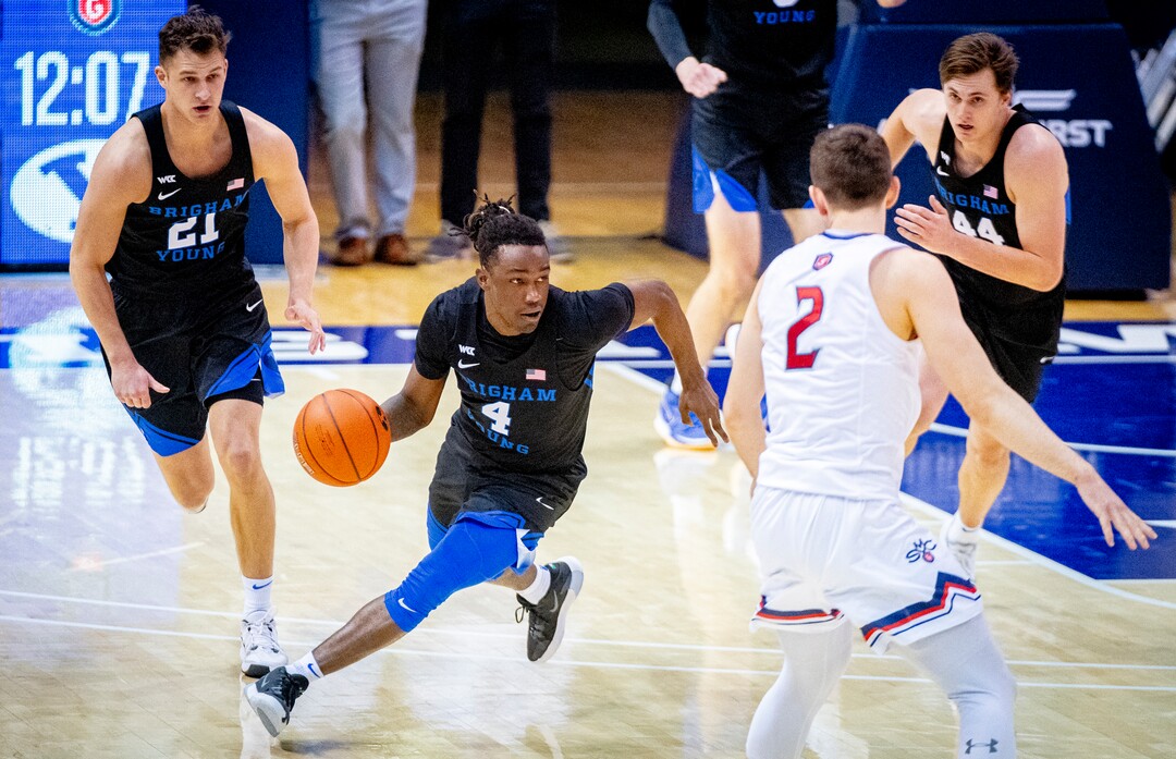 (Isaac Hale | Special to The Tribune) Brigham Young University guard Brandon Averette (4) drives the ball up the court during a game between the BYU Cougars and the Saint Mary’s College of California Gaels held at the Marriott Center in Provo on Saturday, Feb. 27, 2021.