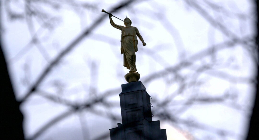 (Sean Michael Smith  |  A statue of the Angel Moroni stands over the Idaho Falls Temple of The Church of Jesus Christ of Latter-day Saints, in a scene from "Church and The Fourth Estate," directed by Brian Knappenberger, an official selection of the Shorts Programs at the 2020 Sundance Film Festival.