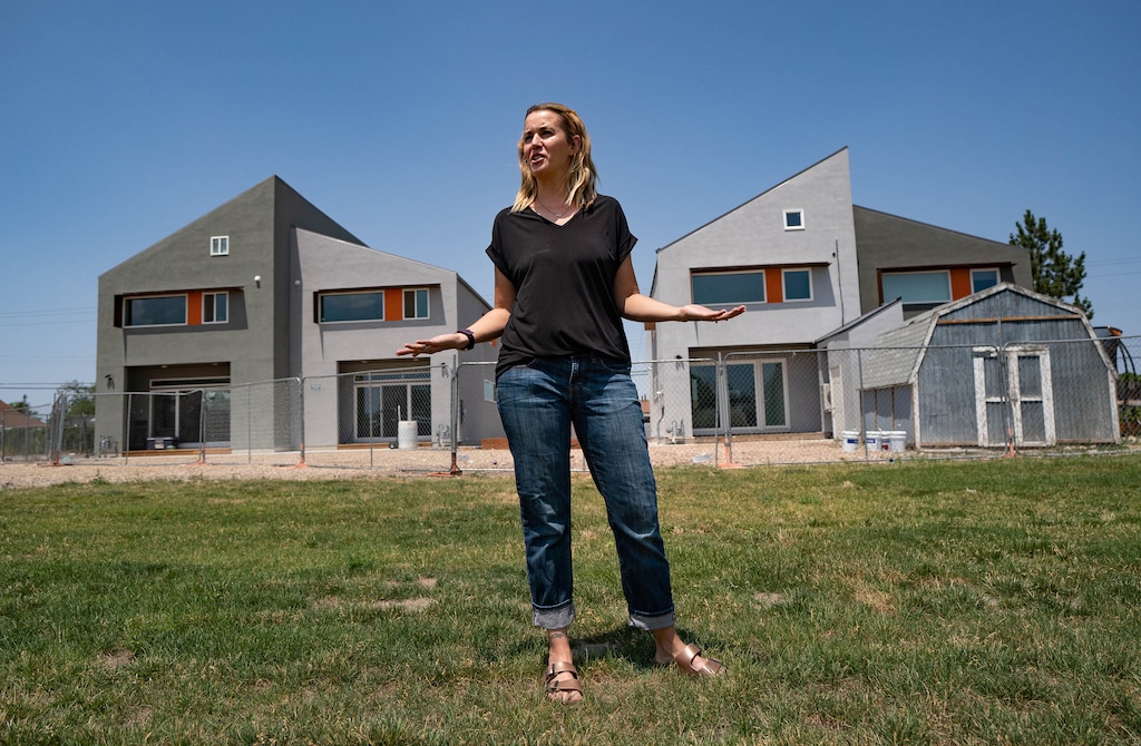 (Francisco Kjolseth | The Salt Lake Tribune) Lillith Bear, who lives in one of four Habitat for Humanity energy-efficient homes built in Kearns, talks about a number of construction challenges she has faced on Thursday, July 15, 2021. In 2015, Habitat for Humanity of the Salt Lake Valley raised a bunch of money for a project to convert an old baseball field into a community with 20 energy-efficient homes. Now 6.5 years later, four have been built, with the other three remaining vacant. Habitat has spent $1.5 million in grants and donations on the project so far. Community members want to know where all the money went and why things are taking so long.