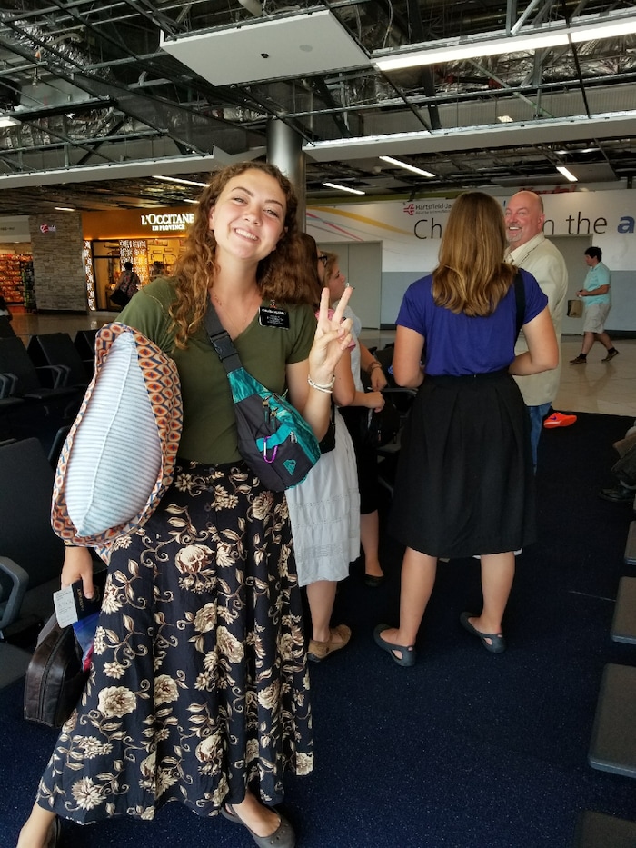 Courtesy | Michael McDonald. Mormon missionary Erin McDonald meets by chance with her parents at the Atlanta airport while evacuating from Puerto Rico on September 23, 2017.