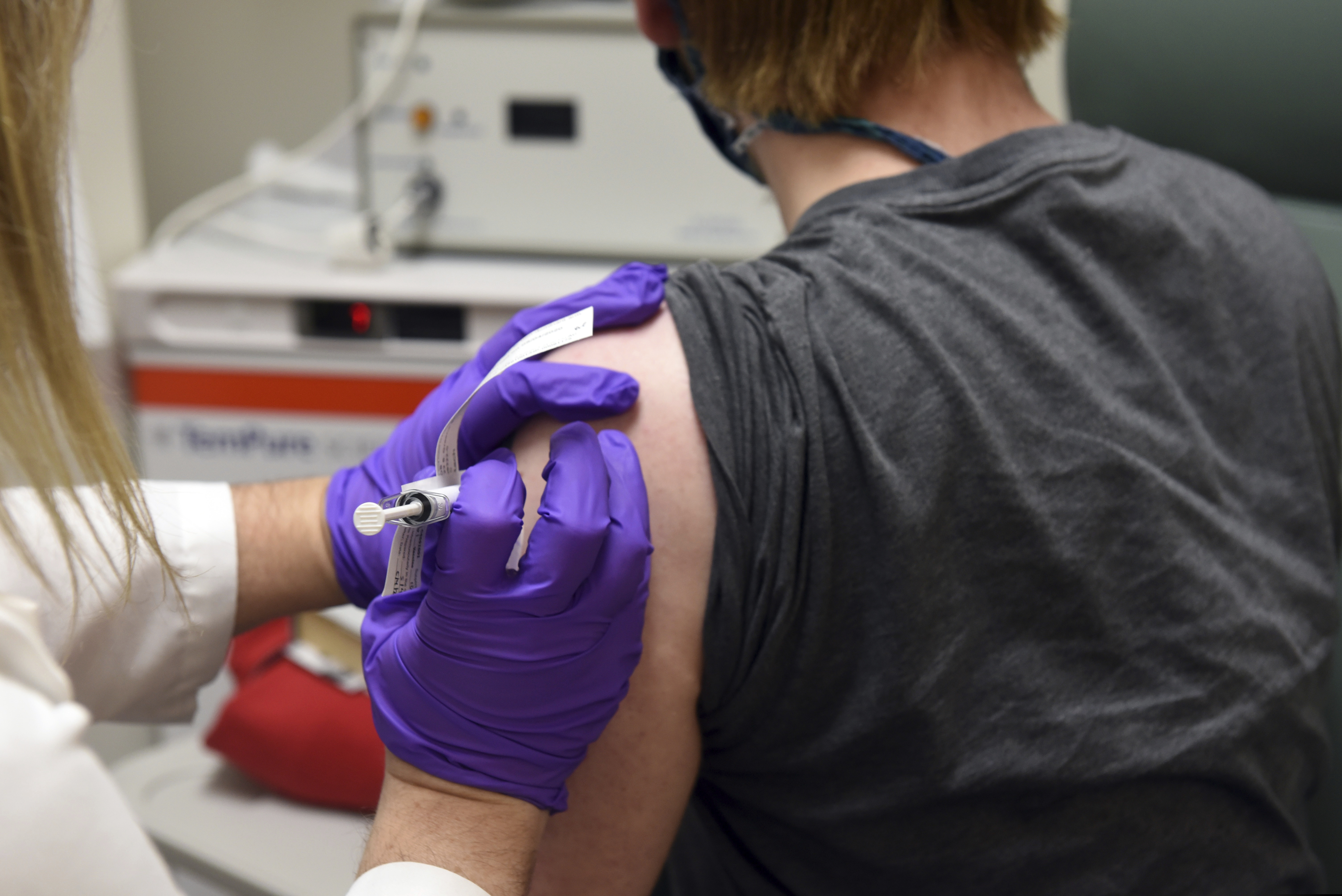 (Courtesy of University of Maryland School of Medicine via AP, File)
This May 4 photo, provided by the University of Maryland School of Medicine, shows the first patient enrolled in Pfizer's COVID-19 coronavirus vaccine clinical trial at the University of Maryland School of Medicine in Baltimore. Pfizer and BioNTech say they've won permission Wednesday, Dec. 2, 2020, for emergency use of their COVID-19 vaccine in Britain, the world’s first coronavirus shot that’s backed by rigorous science -- and a major step toward eventually ending the pandemic.