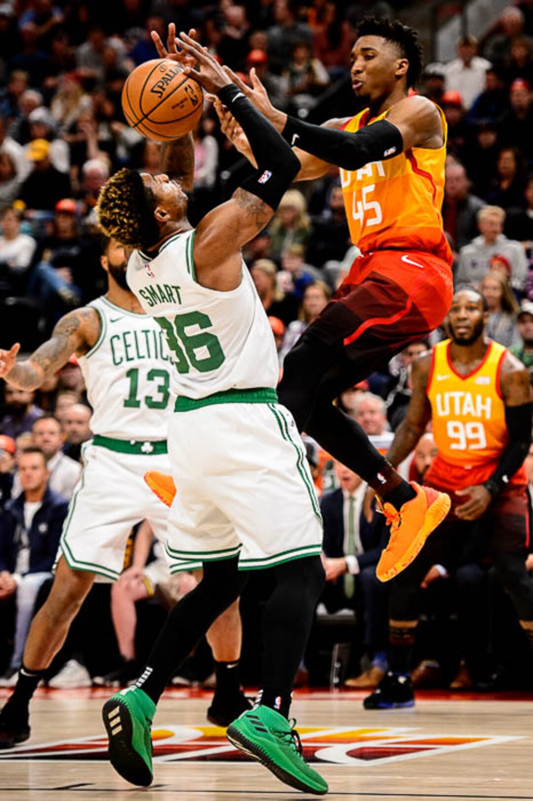 (Trent Nelson | The Salt Lake Tribune)  Utah Jazz guard Donovan Mitchell (45) defended by Boston Celtics guard Marcus Smart (36). Utah Jazz vs. Boston Celtics, NBA basketball in Salt Lake City on Friday Nov. 9, 2018.