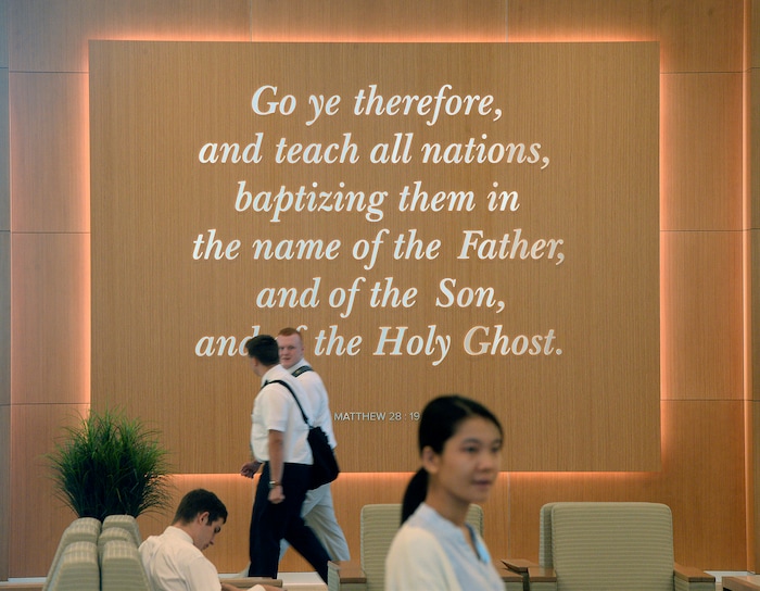 Al Hartmann  |  The Salt Lake TribuneMissionaries come and go to classes in the large, open entrance at the new building at the Missionary Training Center in Provo Wednesday July 26.  The new training building opened in June. 