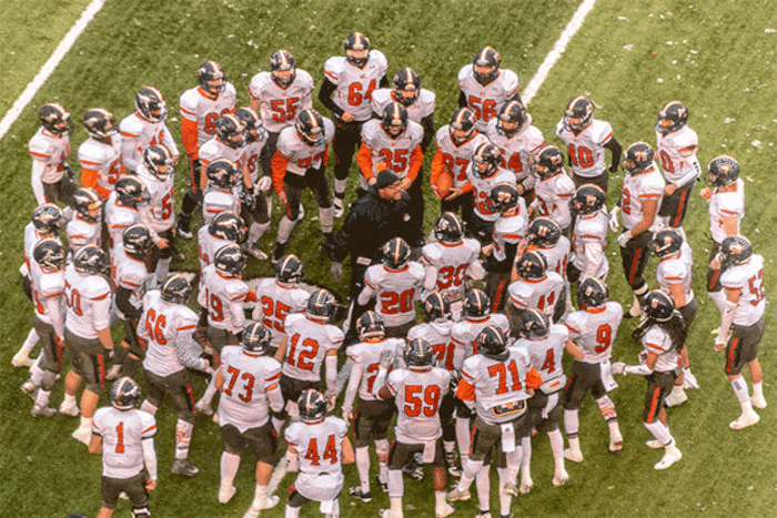 (Trent Nelson | The Salt Lake Tribune)  Mountain View huddles pre-game, as Orem faces Mountain Crest in the Class 4A High School State Football Championship game in Salt Lake City, Friday November 17, 2017.
