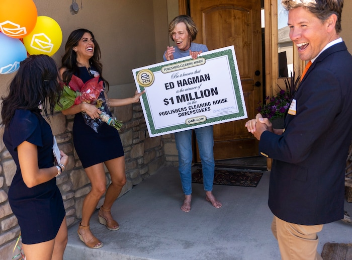 (Rick Egan | The Salt Lake Tribune) Members of the Prize Patrol from Publishers Clearing House, from left,  Bianca Quinnonez, Danielle Lam and  Howie Guja surprise Denise Hagman (center) with the news that she and her husband won $1,000,000, at her home in Herriman, on Friday, May 28th