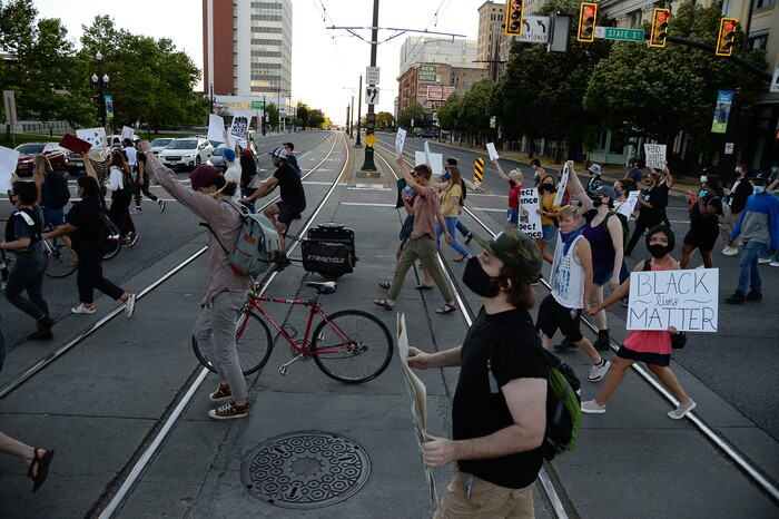 (Francisco Kjolseth  |  The Salt Lake Tribune) Protesters march the streets of downtown Salt Lake City to rally against police brutality on Friday, June 26, 2020.