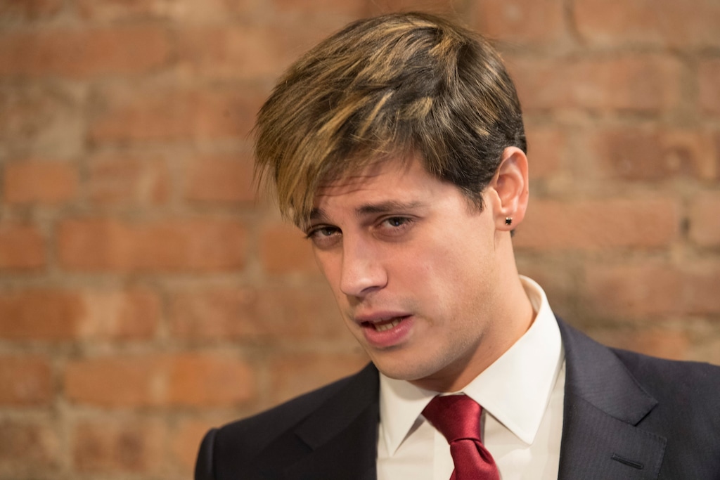 Milo Yiannopoulos speaks during a news conference, Tuesday, Feb. 21, 2017, in New York. Yiannopoulos has resigned as editor of Breitbart Tech after coming under fire from other conservatives over comments on sexual relationships between boys and older men. (AP Photo/Mary Altaffer)