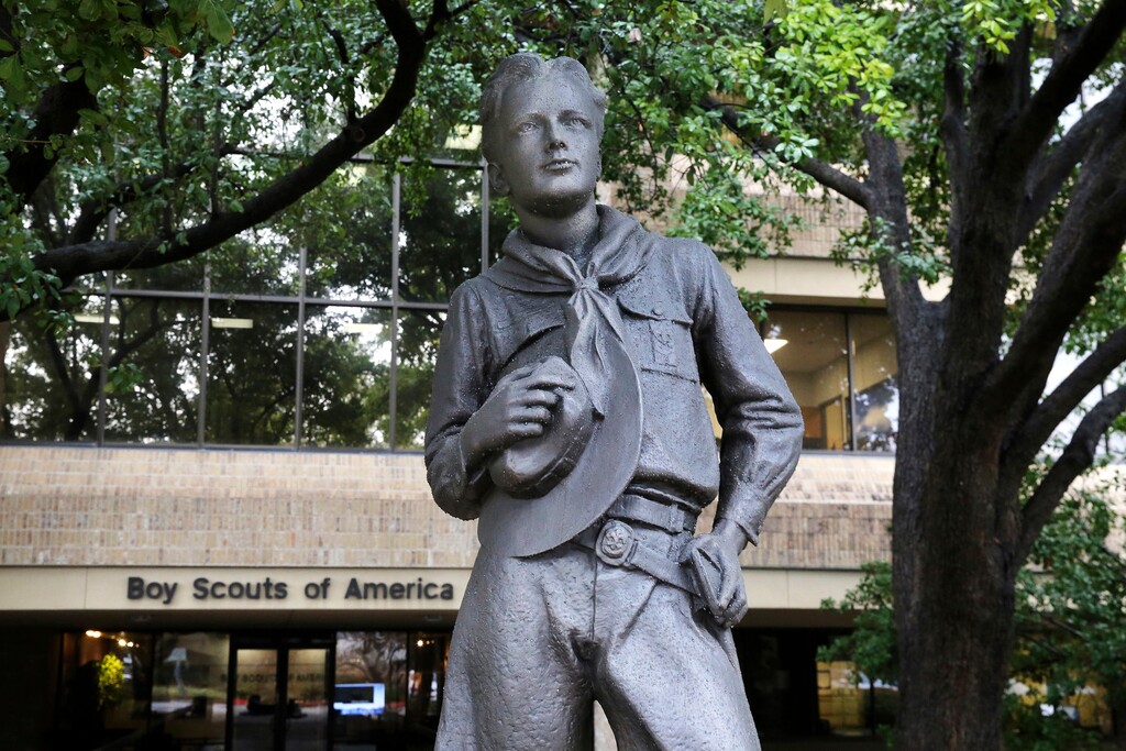 (LM Otero | AP) In this Wednesday, Feb. 12, 2020, photo, a statue stands outside the Boys Scouts of America headquarters in Irving, Texas. The Boy Scouts of America has filed for bankruptcy protection as it faces a barrage of new sex-abuse lawsuits. The filing Tuesday, Feb. 18, in Wilmington, Delaware, is an attempt to work out a potentially mammoth compensation plan for abuse victims that will allow the 110-year-old organization to carry on.