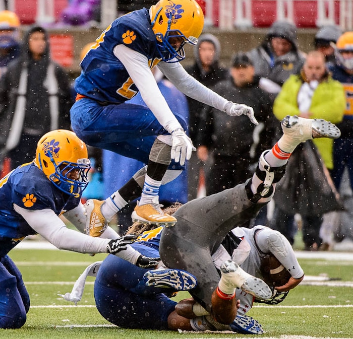 (Trent Nelson | The Salt Lake Tribune)  Mountain Crest's Brady Hall (1) is sacked as Orem faces Mountain Crest in the Class 4A High School State Football Championship game in Salt Lake City, Friday November 17, 2017.