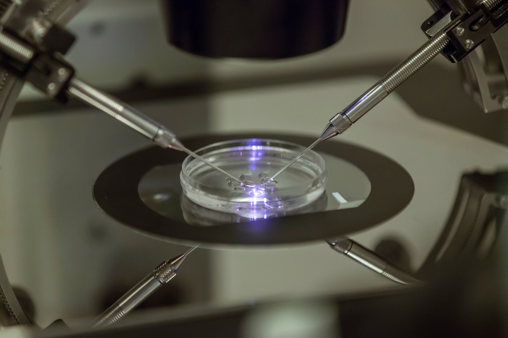 (Sang Tan | The Associated Press) In this Aug. 14, 2013 photo, an in vitro fertilization embryologist works on a petri dish at a fertility clinic in London.