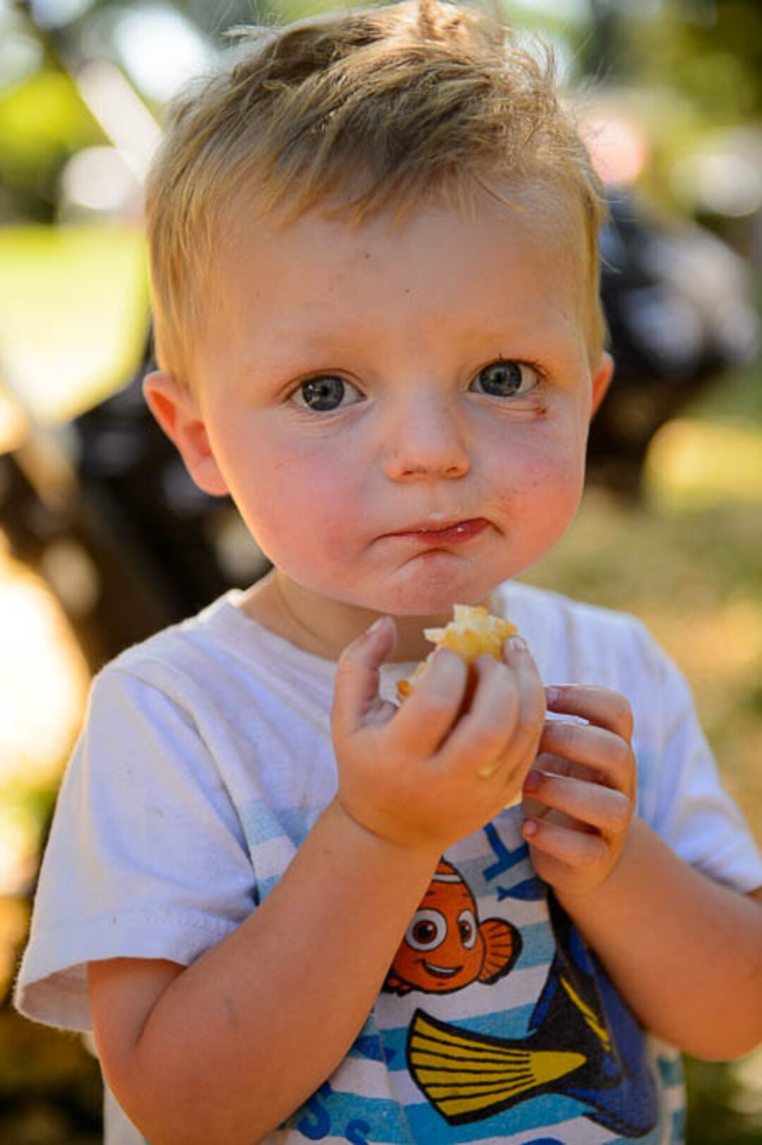 (Trent Nelson | The Salt Lake Tribune)Olliver Whitney eats a pastry from the Fry Me To the Moon food truck at the fourth annual Food Truck Face-Off in Salt Lake City's Liberty Park, Saturday June 30, 2018.