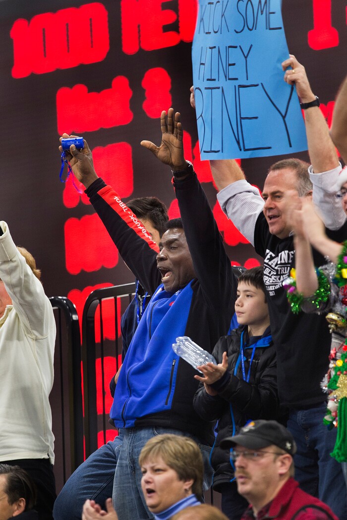 (Scott Sommerdorf   |  The Salt Lake Tribune)   
Kweku Biney, father of Maame Biney, cheers for her as she is introduced prior to her 1000 meter finals race during day 3 of the U.S. short-track Olympic Team Trials at the Utah Olympic Oval, Sunday, December 17, 2017. Biney made the US Olympic team.
