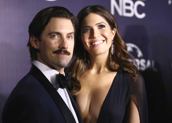 FILE - This Jan. 8, 2017 file photo shows Milo Ventimiglia, left, and Mandy Moore at the NBCUniversal Golden Globes afterparty in Beverly Hills, Calif. The season finale for the popular  time-twisting family drama will air Tuesday at 9 p.m. EST on NBC. (Photo by Rich Fury/Invision/AP, File)