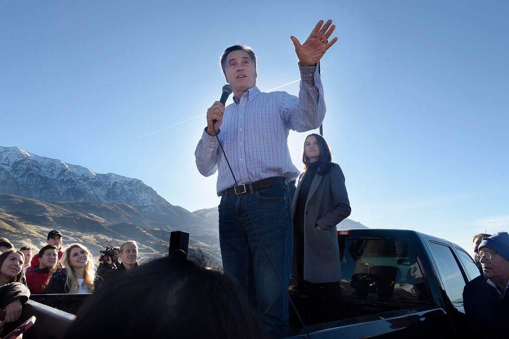 Scott Sommerdorf | The Salt Lake Tribune
Former Republican presidential candidate Mitt Romney speaks from the bed of his pickup truck at a rally for campaign workers gathering signatures in Orem, Saturday, Feb. 17, 2018. His granddaughter Allie is at right.