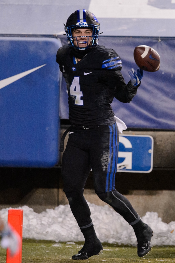 (Trent Nelson | The Salt Lake Tribune) Brigham Young Cougars running back Lopini Katoa (4) celebrates a two-point conversion as BYU hosts San Diego State, NCAA football in Provo on Saturday, December 12, 2020.