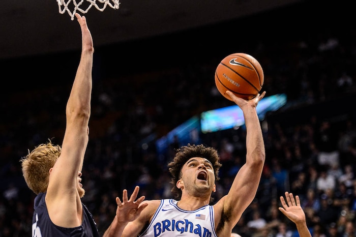 (Trent Nelson | The Salt Lake Tribune)   Brigham Young Cougars guard Elijah Bryant (3) shoots as BYU hosts San Diego, NCAA basketball in Provo Saturday January 20, 2018.