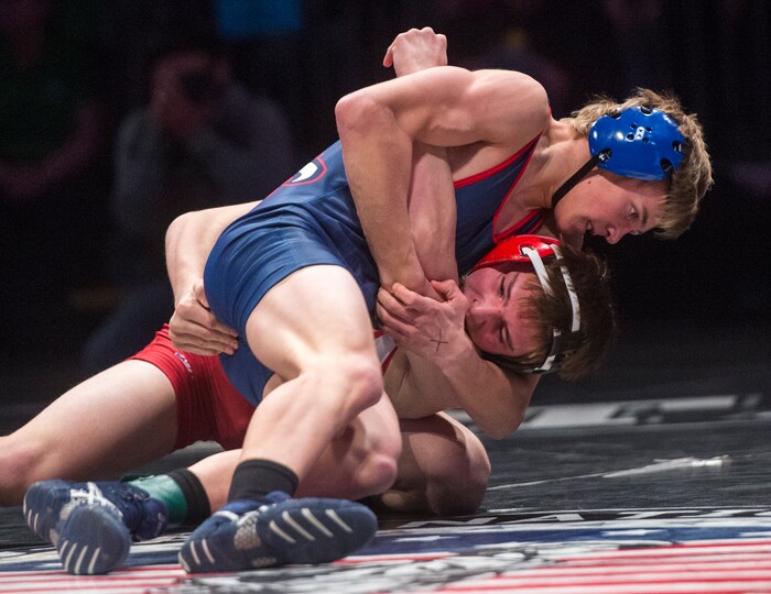 (Rick Egan  |  The Salt Lake Tribune)   Quenton Mortimer (American Leadership Academy) wrestles Triston Fillmore (South Sevier) in the 3A State Wrestling Championship at UVU in Orem, Saturday, February 10, 2018.