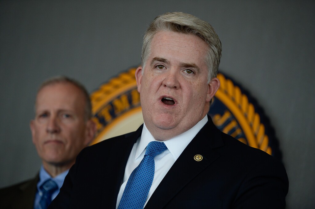 (Francisco Kjolseth  |  The Salt Lake Tribune)   U.S. Attorney for Utah John Huber, right, is joined by Utah Department of Public Safety Commissioner Keith Squires and other officers as they announce the indictment of a man charged with distribution of spice and possession of a fire arm during a press event at the U.S. Attorney's office on Monday, March 12, 2018.