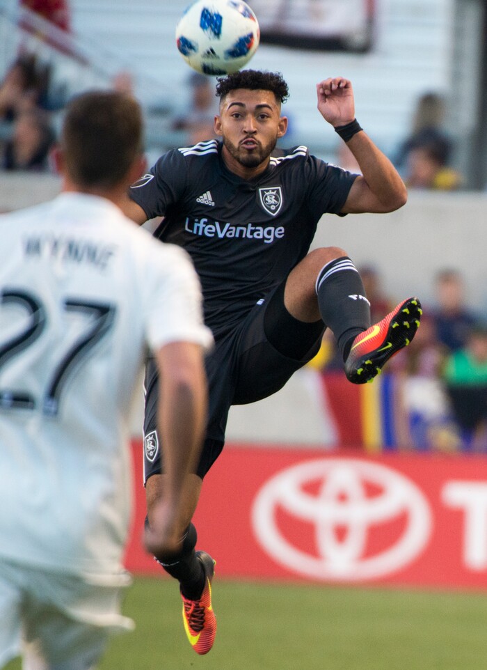 (Rick Egan  |  The Salt Lake Tribune)    Real Salt Lake midfielder Danilo Acosta (25) heads the ball in MLS soccer action, RSL vs Colorado Rapids at Rio Tinto Stadium, Saturday, April 21, 2018.



