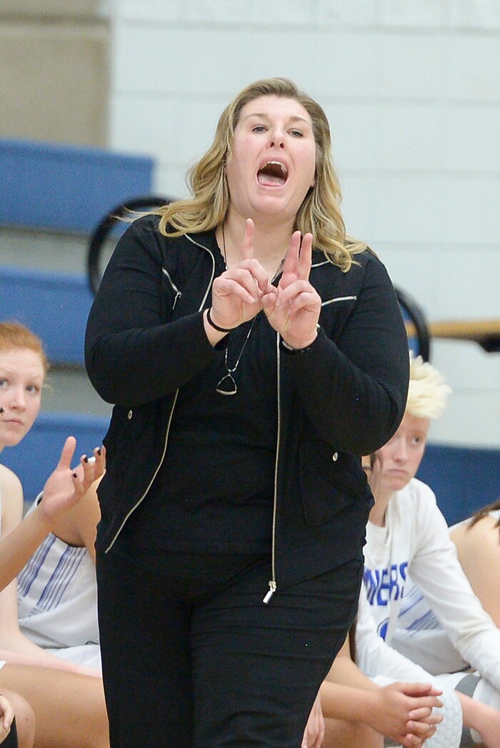 (Leah Hogsten  |  The Salt Lake Tribune) Bingham's head coach Charron Mason makes the call.  Bingham defeated Copper Hills 48-40 in their semifinal game of the 6A High School Girls' Basketball Tournament at SLCC in Taylorsville, Friday, Feb. 23, 2018. 