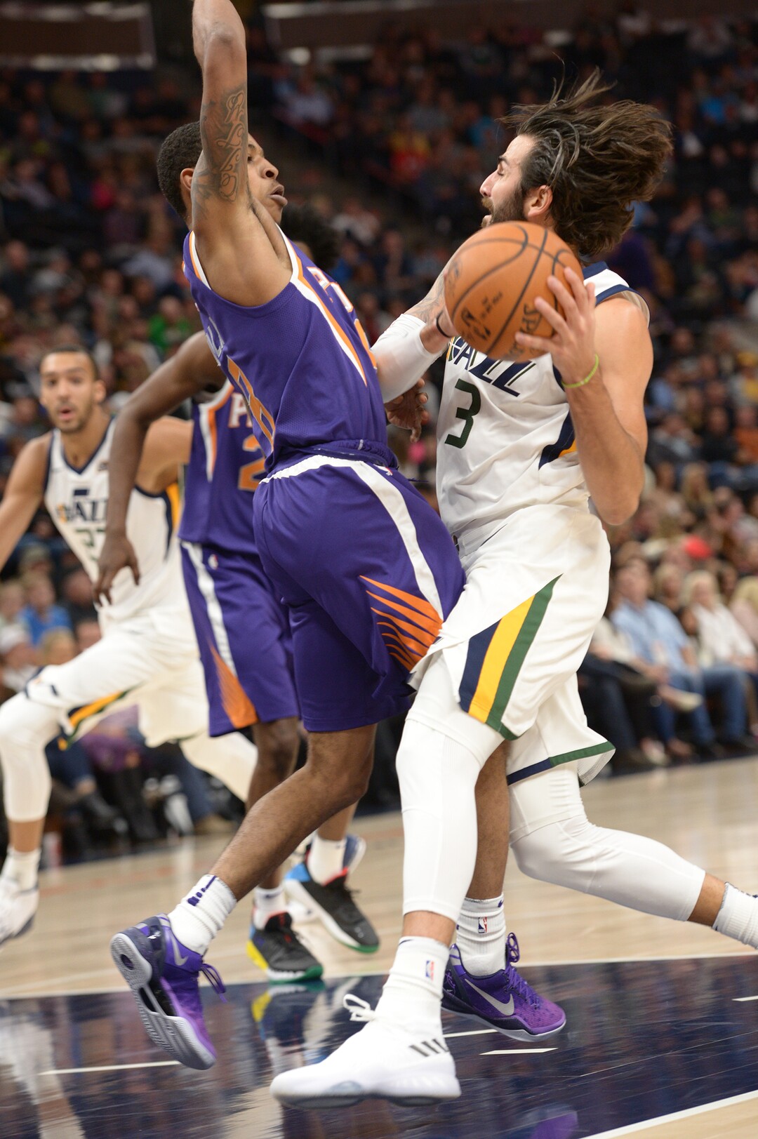 (Leah Hogsten  |  The Salt Lake Tribune)  Utah Jazz guard Ricky Rubio (3) collides with Phoenix Suns guard Tyler Ulis (8). The Utah Jazz defeated the Phoenix Suns 112-101 during preseason NBA basketball at Vivint Smart Home Arena in Salt Lake City, October 6, 2017.