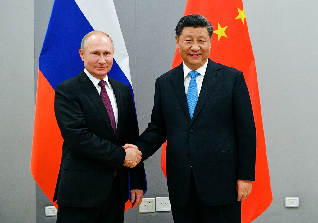 (Ramil Sitdikov, Sputnik, Kremlin Pool Photo via AP)

In this Nov. 12, 2019, photo, Russian President Vladimir Putin, left, and China's President Xi Jinping shake hands prior to their talks on the sideline of the 11th edition of the BRICS Summit, in Brasilia, Brazil.