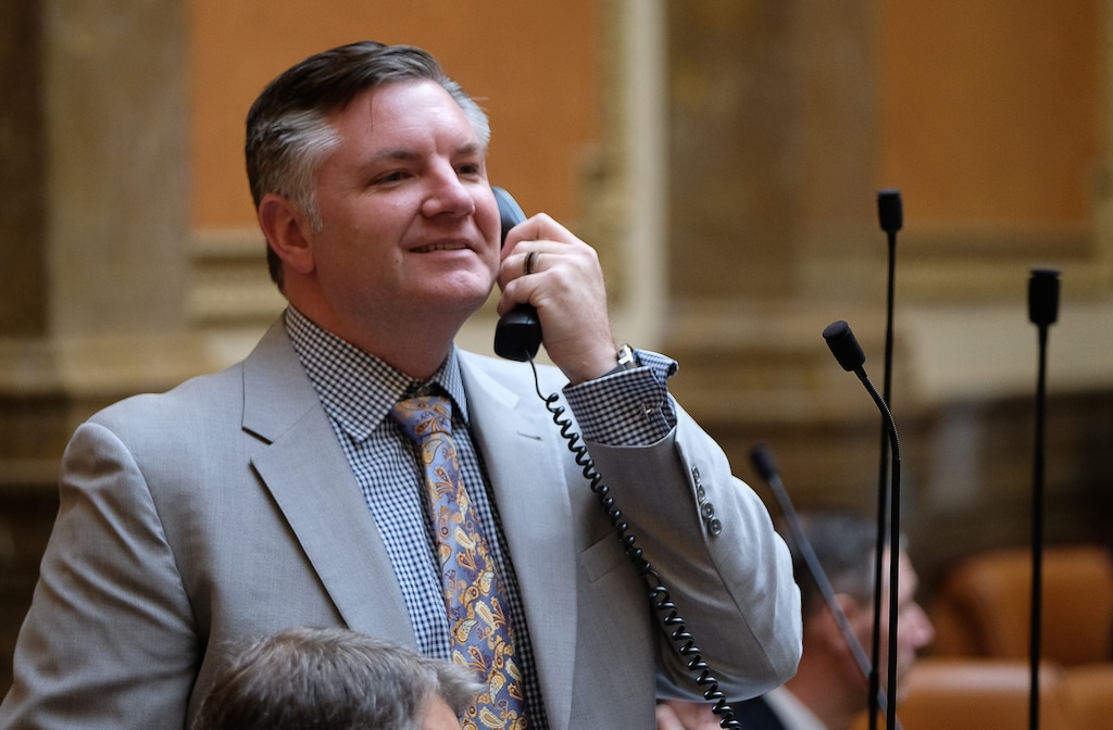 (Francisco Kjolseth  |  The Salt Lake Tribune) Rep. John Knotwell, R-Herriman, sponsor of HB169 which would shift $1.7 million in fees owed by EnergySolutions to taxpayers speaks on the phone during the legislative session at the Utah Capitol on Wednesday, Jan. 31, 2018.