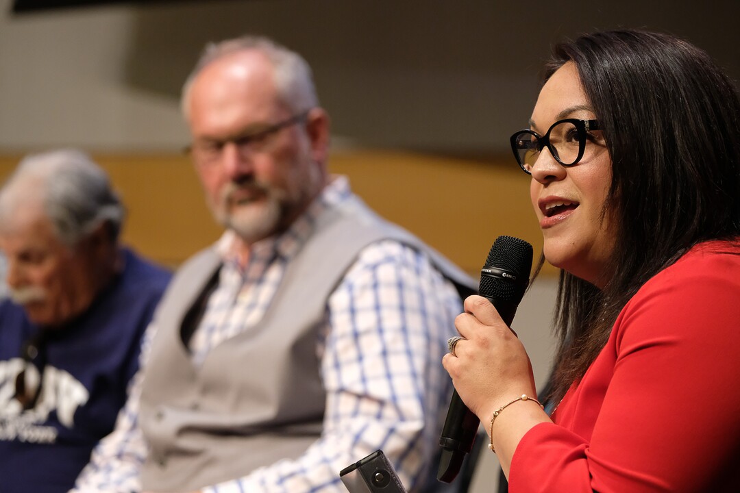 (Francisco Kjolseth  |  The Salt Lake Tribune)  Luz Escamilla takes a turn at the mic as the eight candidates for Salt Lake City mayor gather for a debate at the Salt Lake City Library on Wed. June 26, 2019.
