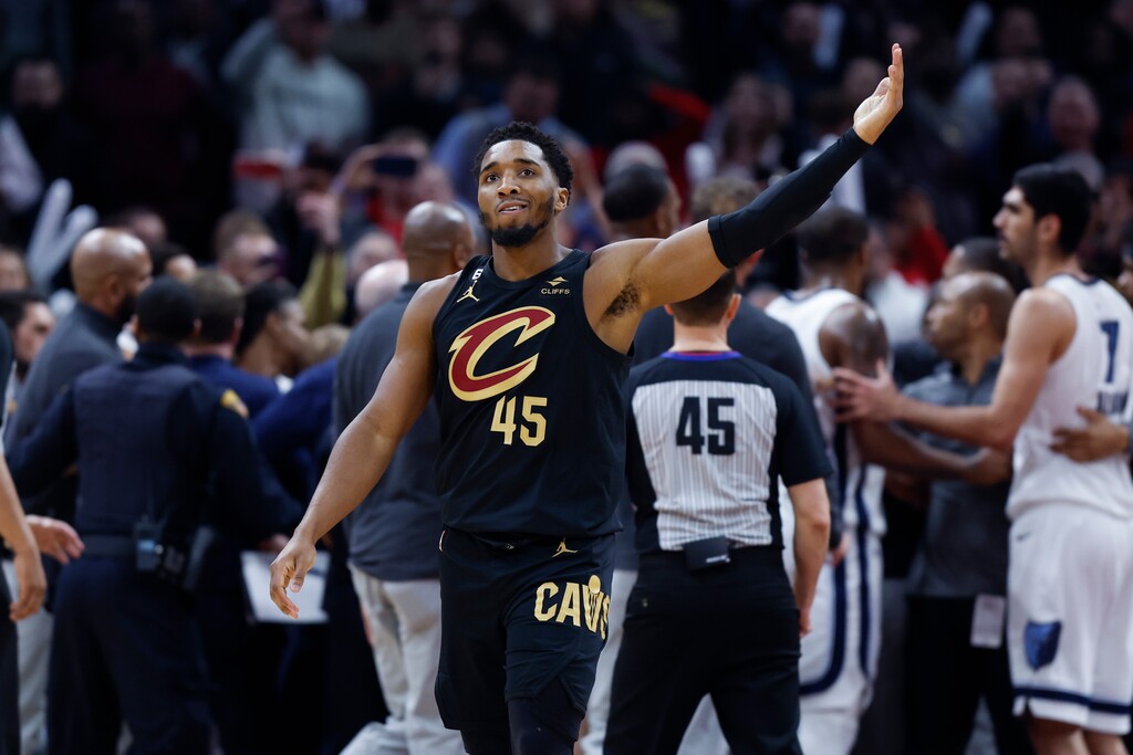 (Ron Schwane | AP) Cleveland Cavaliers guard Donovan Mitchell waves to the crowd after fighting with Memphis Grizzlies forward Dillon Brooks during the second half of an NBA basketball game, Thursday, Feb. 2, 2023, in Cleveland. Mitchell and Brooks were ejected from the game.