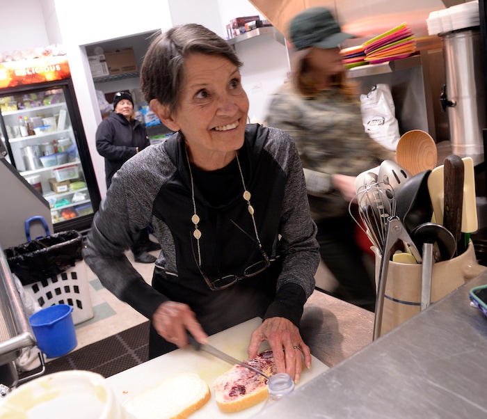 (Al Hartmann  |  The Salt Lake Tribune) Karleen Reilly looks up from making a sandwich to greet a friend at Uptown Fare in Park City.   She has been the tell-it-like-it-is owner of Uptown Fare in Park City for nearly two decades. Originally, her sandwich shop was in an underground building on Main Street. But it moved to a new location — attached to the Kimball Arts Center — a few years ago. She has announced her retirement on March 1, so this will be her last Sundance Film Festival.
