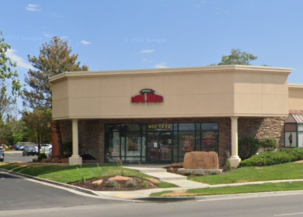 (Screenshot via Google Maps) A man was arrested after allegedly firing several rounds at the Papa John's restaurant in Draper on Sunday night.