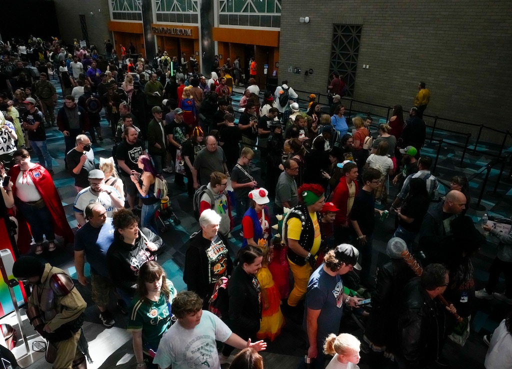 (Bethany Baker | Salt Lake Tribune) Attendees line up outside the grand ballroom for a panel during FanX at Salt Palace Convention Center in Salt Lake City on Saturday, Sept. 23, 2023. The 2024 SLC FanX convention takes place from Sept. 26-28.