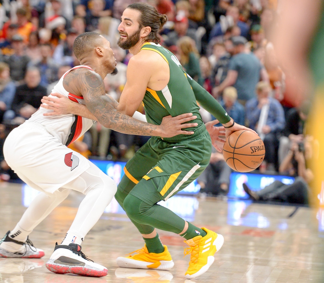 Leah Hogsten  |  The Salt Lake Tribune  Portland Trail Blazers guard Damian Lillard (0) pressures Utah Jazz guard Ricky Rubio (3). The Utah Jazz defeated the Portland Trail Blazers, 117-96, Christmas night at Vivint Smart Home Arena.