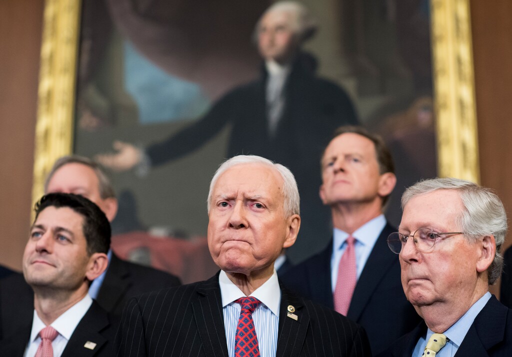 (Bill Clark  |  CQ Roll Call via AP)  From left, Speaker of the House Paul Ryan, R-Wisc., Senate Finance Committee chairman Orrin Hatch, R-Utah, and Senate Majority Leader Mitch McConnell, R-Ky., participate in the Congressional GOP media availability to unveil the GOP tax reform plan in the Capitol on Wednesday, Sept. 27, 2017.