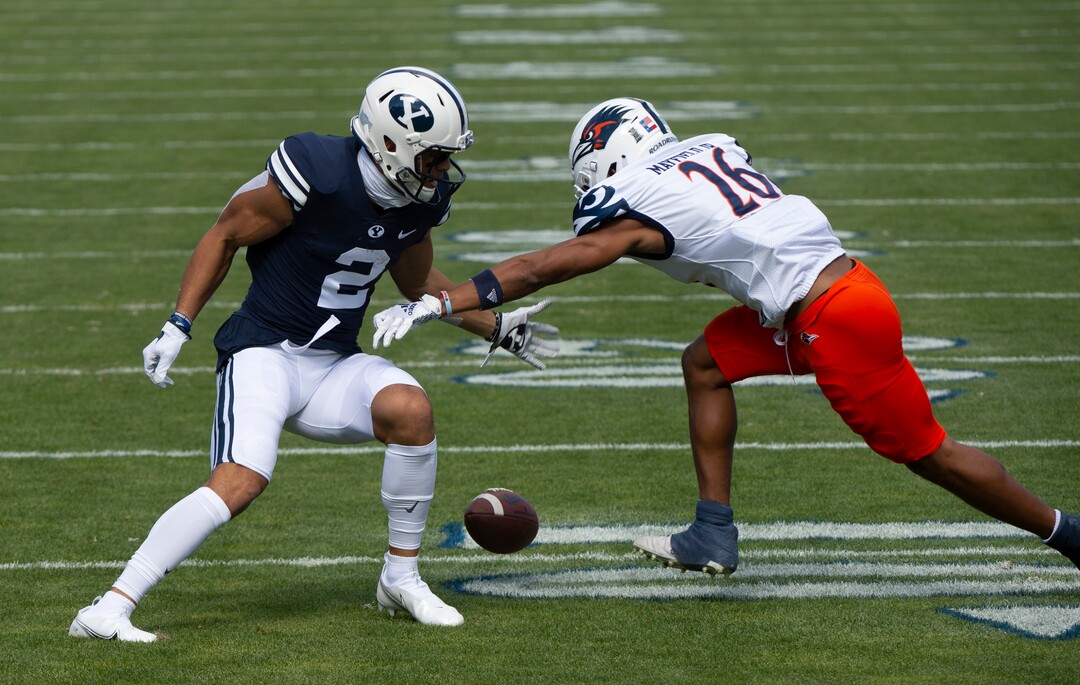 (Rick Egan  |  The Salt Lake Tribune)    Brigham Young Cougars wide receiver Neil Pau'u (2) has the ball stripped by UTSA Roadrunners cornerback Corey Mayfield Jr. (26), resulting in a fumble, in football action between the Brigham Young Cougars and the UTSA Roadrunners, at Lavell Edwards stadium, Saturday, Oct. 10, 2020.