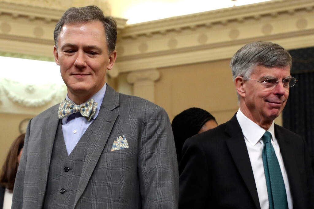 (Andrew Harnik | AP) Top U.S. diplomat in Ukraine William Taylor, and career Foreign Service officer George Kent, left, walk back from a break as they testify before the House Intelligence Committee on Capitol Hill in Washington, Wednesday, Nov. 13, 2019, during the first public impeachment hearing of President Donald Trump's efforts to tie U.S. aid for Ukraine to investigations of his political opponents.