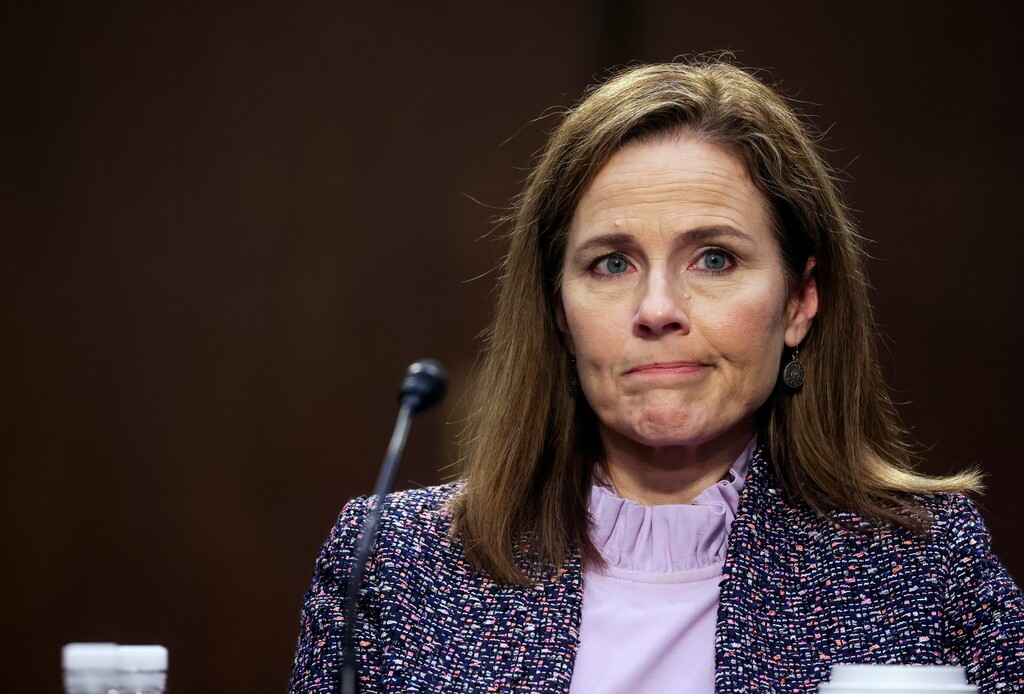 (Jonathan Ernst | AP file photo, pool) Supreme Court nominee Amy Coney Barrett departs with her husband, Jesse, after the third day of her confirmation hearings before the Senate Judiciary Committee on Capitol Hill in Washington, Wednesday, Oct. 14, 2020.