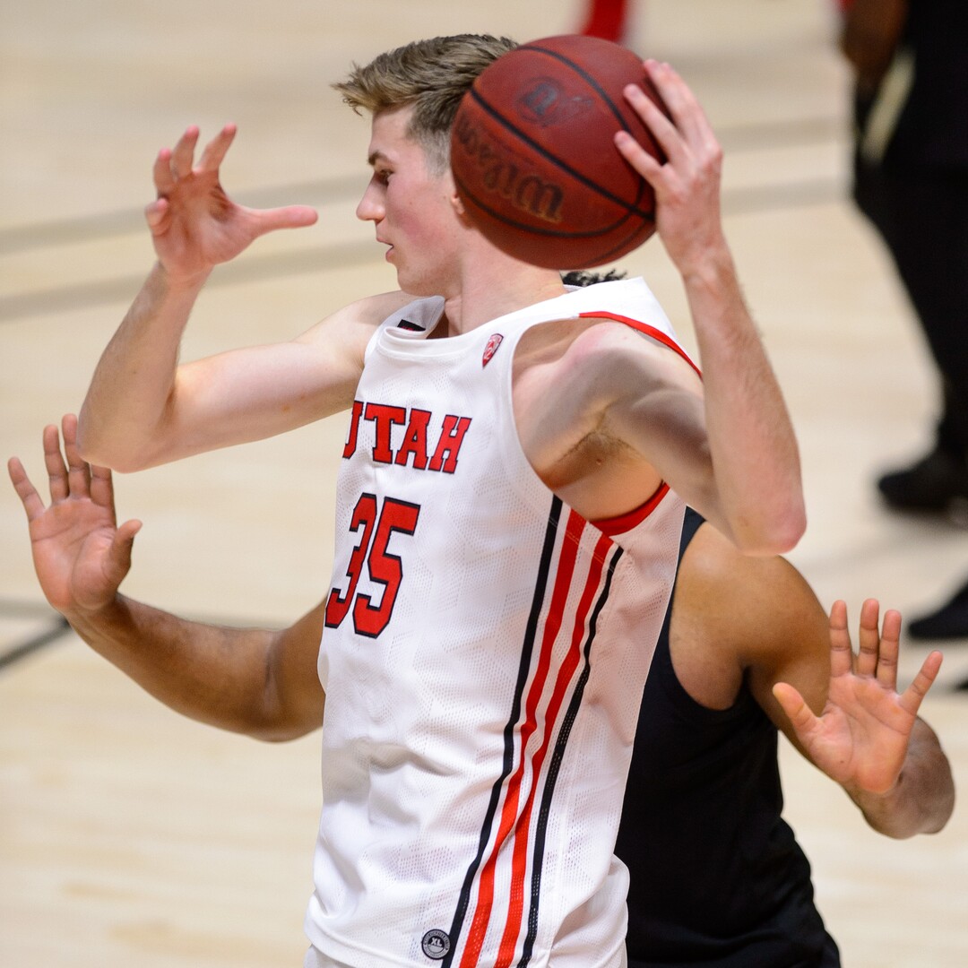 (Trent Nelson  |  The Salt Lake Tribune) Utah Utes center Branden Carlson (35) pulls in a rebound as Utah hosts Colorado, NCAA basketball in Salt Lake City on Monday, Jan. 11, 2021.