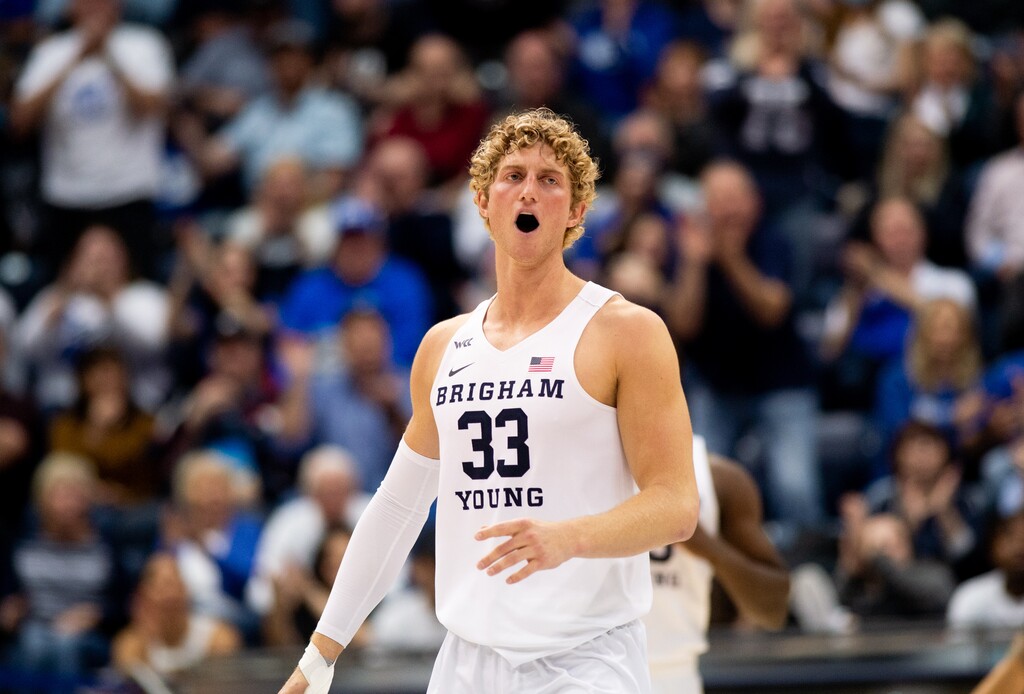(Rachel Rydalch | The Salt Lake Tribune) Brigham Young Cougars forward Caleb Lohner (33) celebrates after a score on offense in the NIT quarter finals between the Brigham Young Cougars and the Washington State Cougars on Wednesday, March 23, 2022.