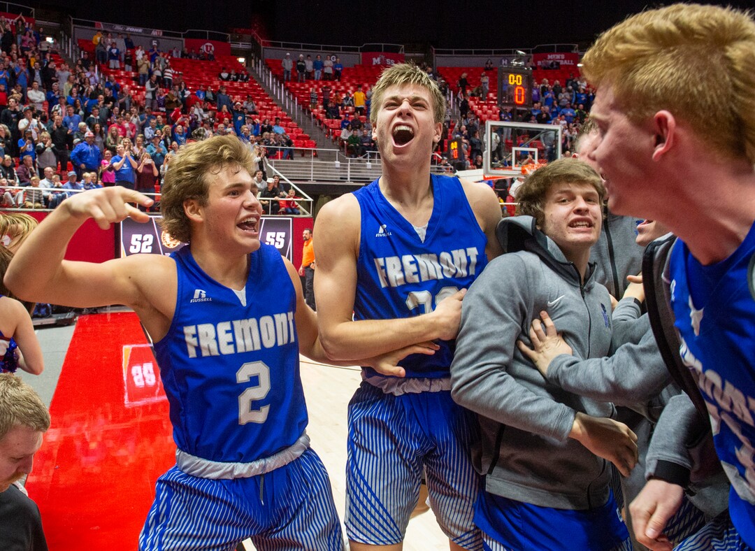(Rick Egan  |  The Salt Lake Tribune)    The Fremont Silverwolves Talmage Mitchell (2) and  Dallin Hall (30) celebrate their 55-52 win over the Davis Darts, in the 6A basketball championship game at the Jon M. Huntsman Center, Saturday Feb. 29, 2020