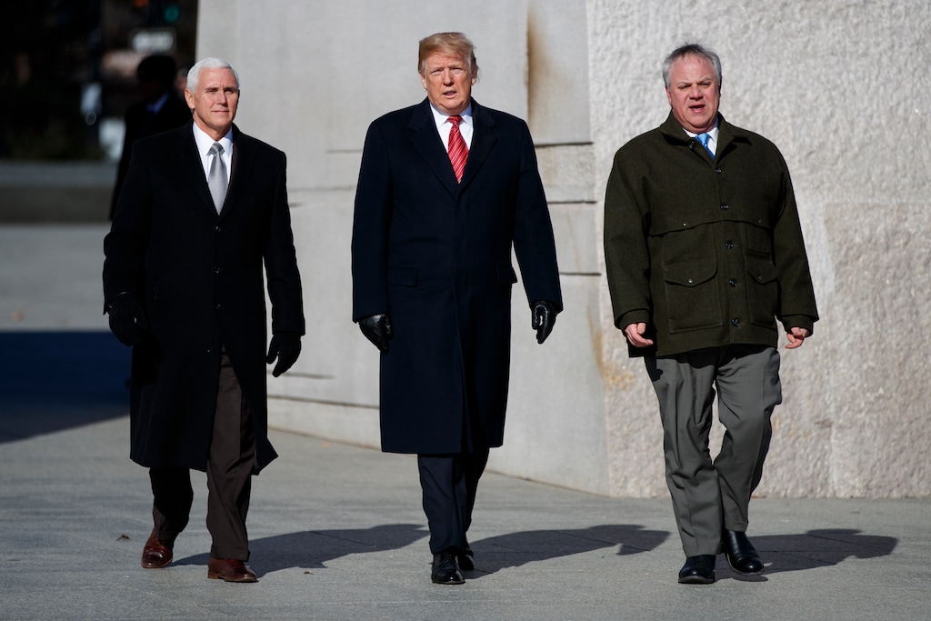 (Evan Vucci | AP Photo) President Donald Trump, center, Vice President Mike Pence, left, escorted by Acting Interior Secretary David Bernhardt, right, visit the Martin Luther King Jr. Memorial, Monday, Jan. 21, 2019, in Washington.
