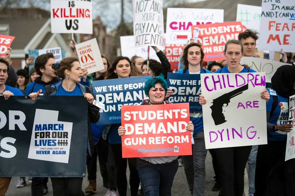 (Chris Detrick | The Salt Lake Tribune) Participants march from West High School to the state Capitol during the March for Our Lives SLC Saturday, March 24, 2018. The student-led March for Our Lives SLC got underway about 11:30 a.m. with what police estimated were 8,000 participants walking from Salt Lake CityÕs West High School to the front steps of the state Capitol.