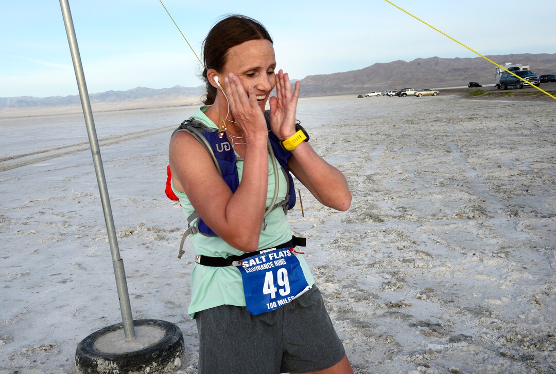 (Scott Sommerdorf | The Salt Lake Tribune)Melissa Soper reacts after crossing the finish line at the Salt Flats 100 Endurance Run, Saturday, May 5, 2018. Soper was the first woman to finish the race. She finished 9th overall.
